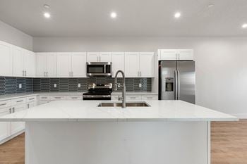 Kitchen with sink and cabinetry